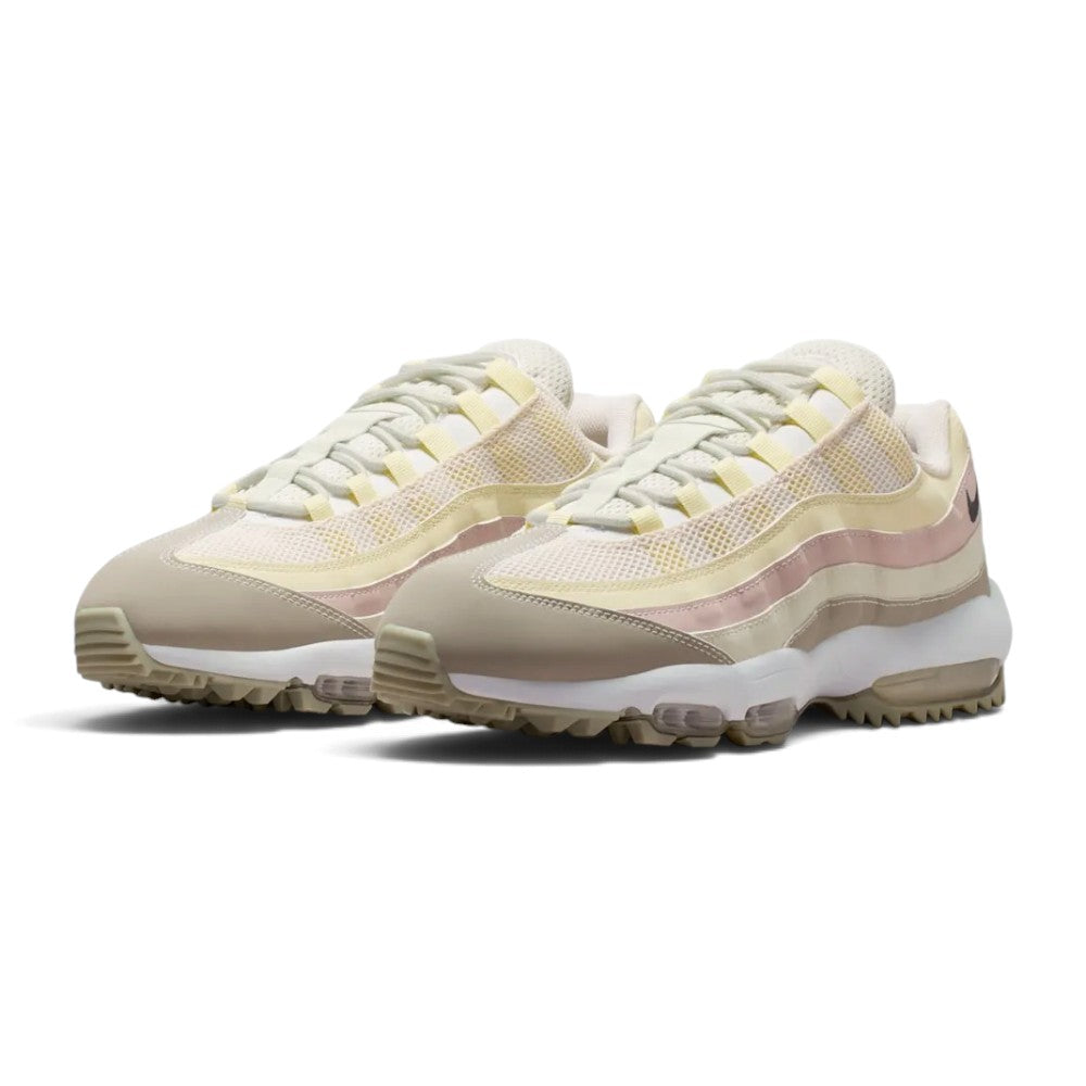 Forward three-quarter angle showcasing both shoes side by side, highlighting the iconic 95 aesthetic, pastel-earthy colour blocking, and sturdy athletic stance.