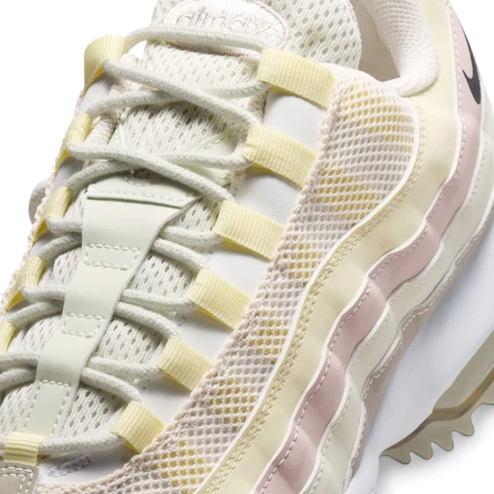 Macro focus on the forefoot and eyestay zone, detailing the fine synthetic leather texture, breathable mesh tongue webbing, and the anatomical lace loops.