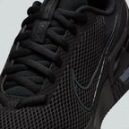 Details the high-definition durability overlays shielding the toe strike zone and the precision eyelet stitching.