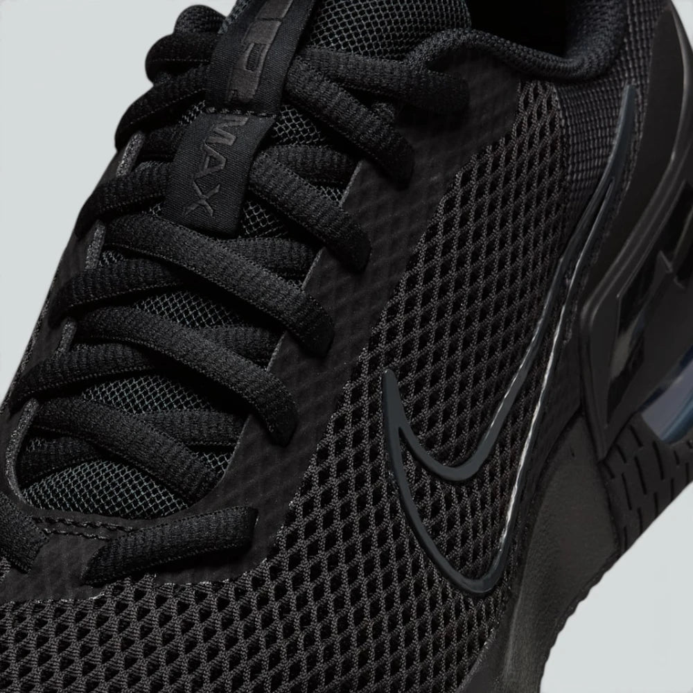 Details the high-definition durability overlays shielding the toe strike zone and the precision eyelet stitching.