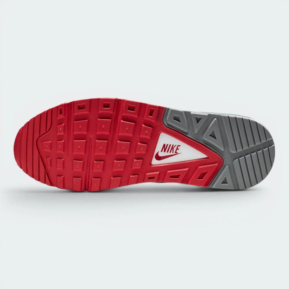 Displays the high-grip waffle-inspired rubber outsole, showcasing the bold split colourway with a Gym Red front section, a central white triangular Nike-branded plate, and a Cool Grey heel grid built for reliable traction.