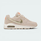 Highlights the high-velocity "Gold" Swoosh and the professional depth of the "String" leather panels.