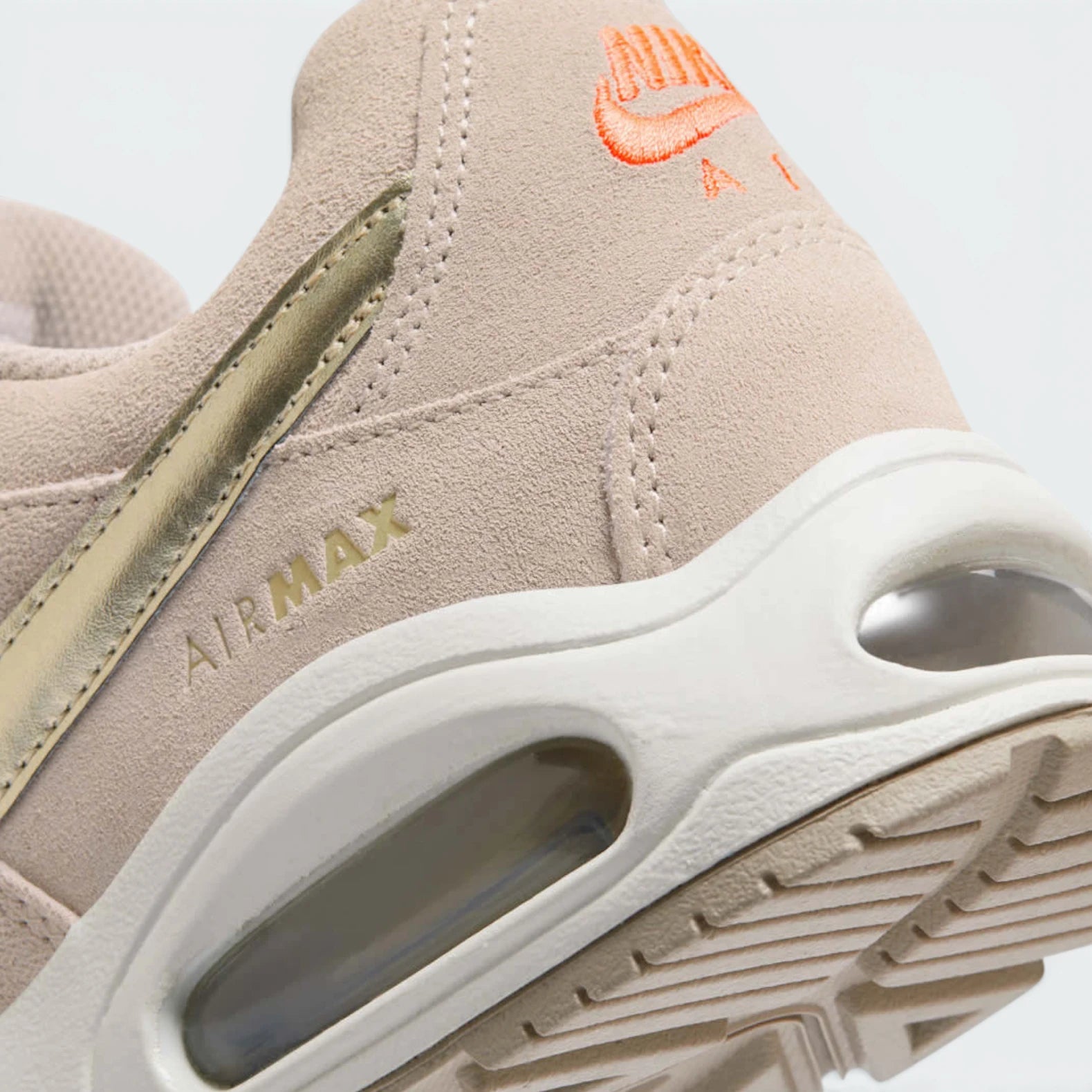 Highlights the technical foam midsole and the "unreal" finish of the visible air chamber.