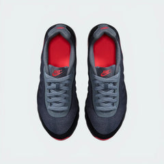 Top-Down View of Pair: Focuses on the Breathe Tech mesh texture and the symmetrical junior-specific lacing system.