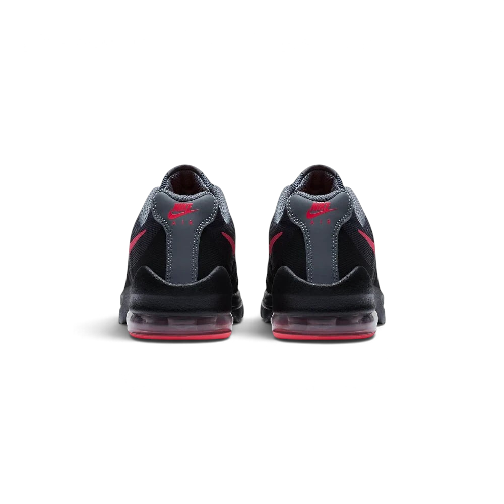 View from Behind Looking at the Heel: Focuses on the "Nike Air" branding and the structured support housing the pink Air unit.