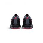 View from Behind Looking at the Heel: Focuses on the "Nike Air" branding and the structured support housing the pink Air unit.