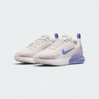 Emphasises the low-cut, athletic stance of the junior shoes, showcasing the harmonious blend of Phantom mesh, Sapphire blue Swooshes, and the vibrant translucent purple Max Air heel units.