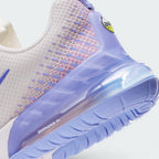 Highlights the "unreal" clean finish where the white foam cushioning carrier meets the translucent purple Max Air heel clip, showcasing the debossed "AIRMAX En" branding on the bubble window.