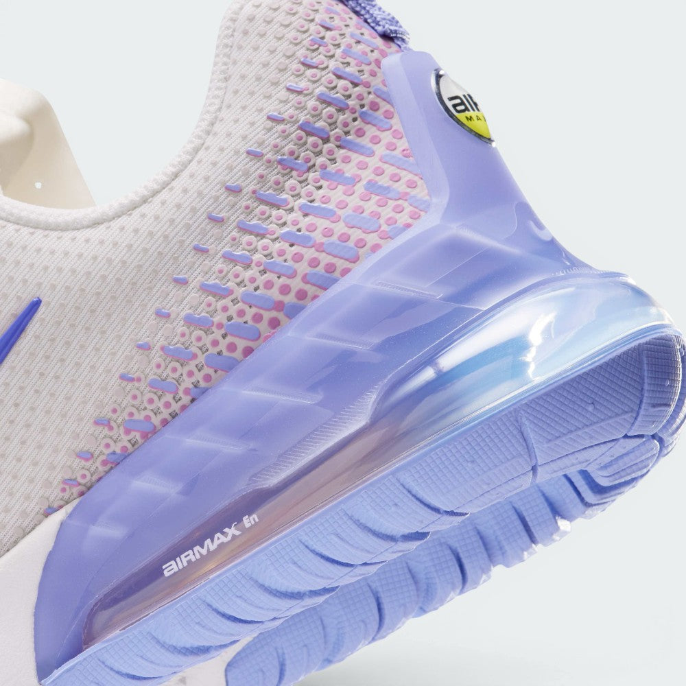 Highlights the "unreal" clean finish where the white foam cushioning carrier meets the translucent purple Max Air heel clip, showcasing the debossed "AIRMAX En" branding on the bubble window.