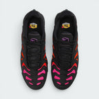 Focuses on the locked-in central lacing layout, displaying the perfect symmetry of the dark textile tongue, the integrated lace loops, and the fiery orange burst framing the front toe box area.