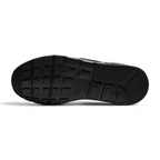 Outsole View: Showing the rubber traction pattern and the integrated flex grooves for natural movement.