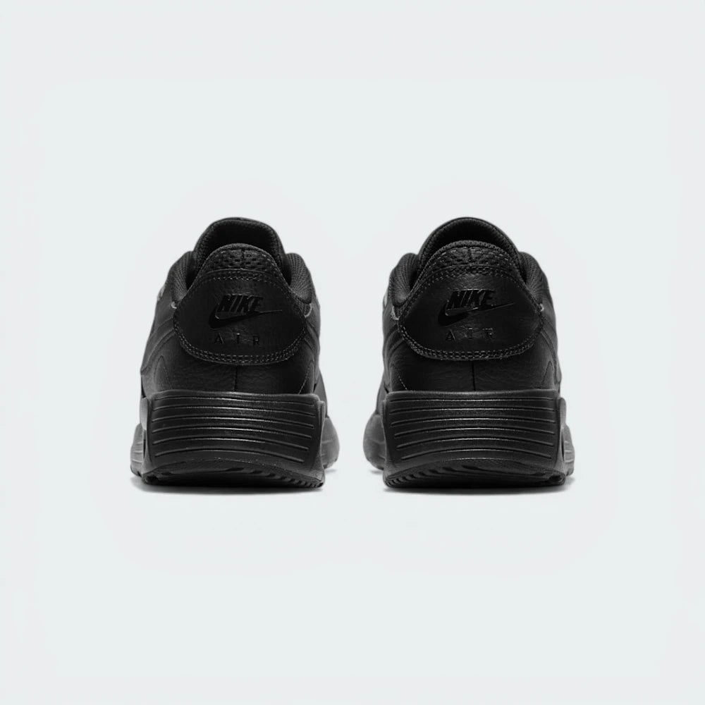View from Behind Looking at the Heel: Focusing on the embroidered Nike Air branding and the streamlined finish of the foam midsole.
