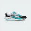 Highlights the high-velocity sweep of the sharp Black Nike Swoosh, showing the professional, texturized weave of the White mesh base, the clean lines of the Pure Platinum overlays, and the visible window of the Max Air unit in the heel.