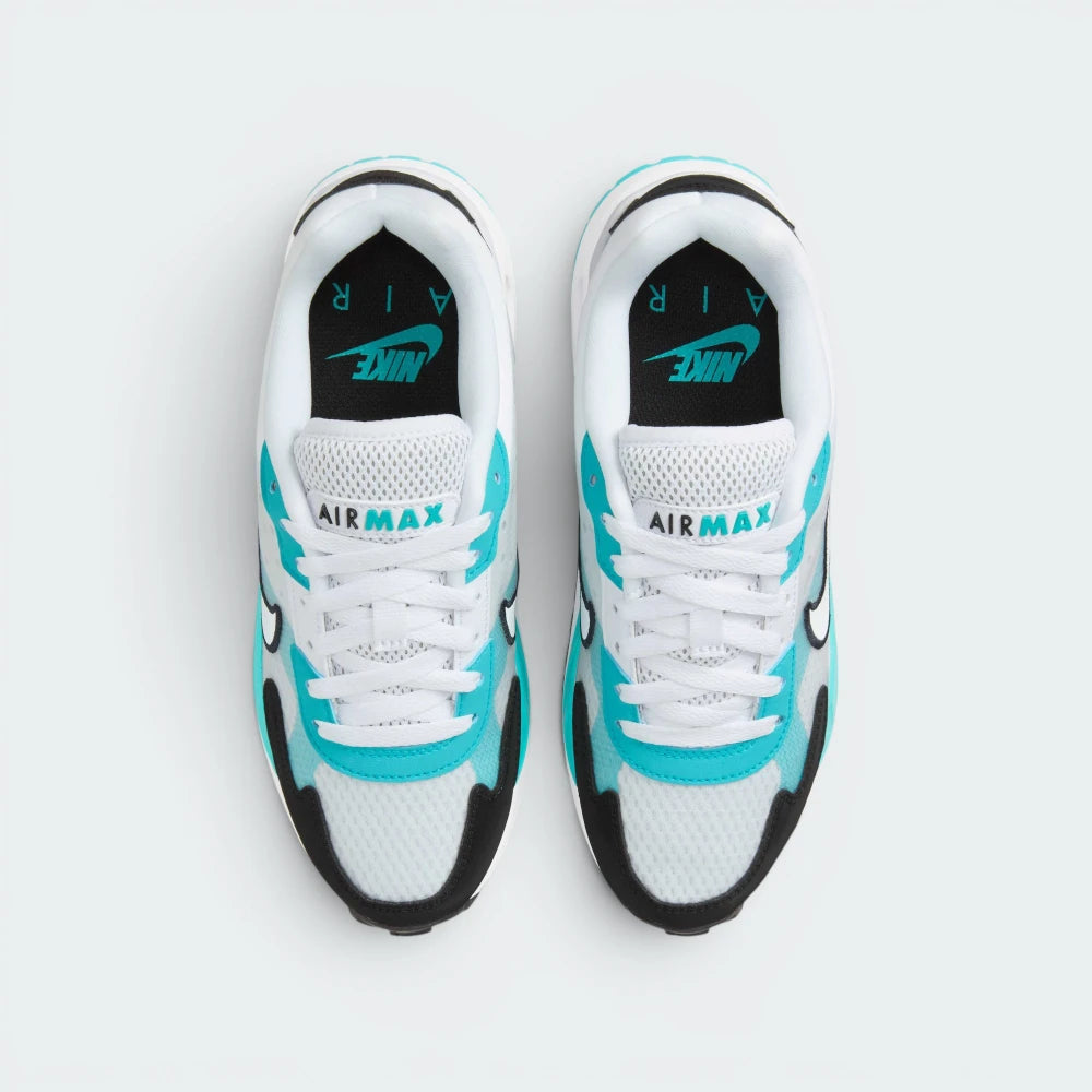 Focuses on the locked-in traditional lacing layout, displaying the perfect symmetry of the white mesh tongue, the textile eyelet bands, and the airy mesh guarding the front toe box area.