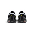 Rear-facing perspective focusing on the structured heel counter, reflective pull loops, and the translucent window of the Max Air heel unit.