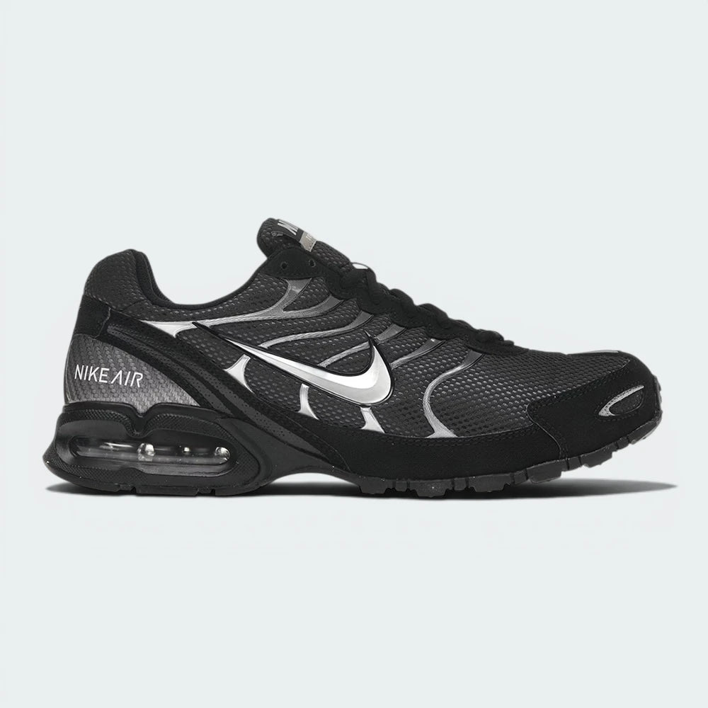 Highlights the aerodynamic silhouette and the high-visibility Max Air unit in the heel.