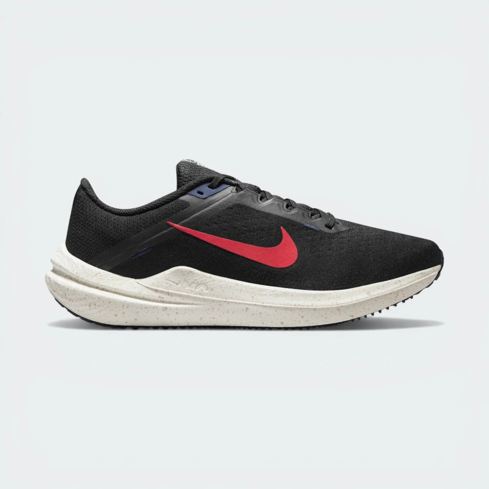 Side Profile Image: The Black Winflo 10, highlighting the Bright Crimson Swoosh and the Sail-coloured responsive midsole. Main image