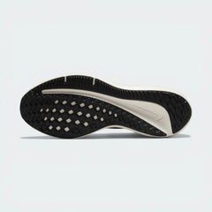 Outsole View: Showing the durable rubber traction pattern designed for reliable road grip.