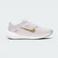 Highlights the high-velocity sweep of the Pacific Moss green Nike Swoosh, showing the professional texture of the Platinum Violet engineered mesh upper, the stitched accent bar, and the crisp white foam midsole wall.