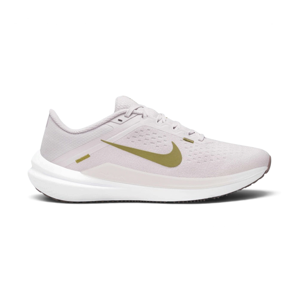 Highlights the high-velocity sweep of the Pacific Moss green Nike Swoosh, showing the professional texture of the Platinum Violet engineered mesh upper, the stitched accent bar, and the crisp white foam midsole wall.