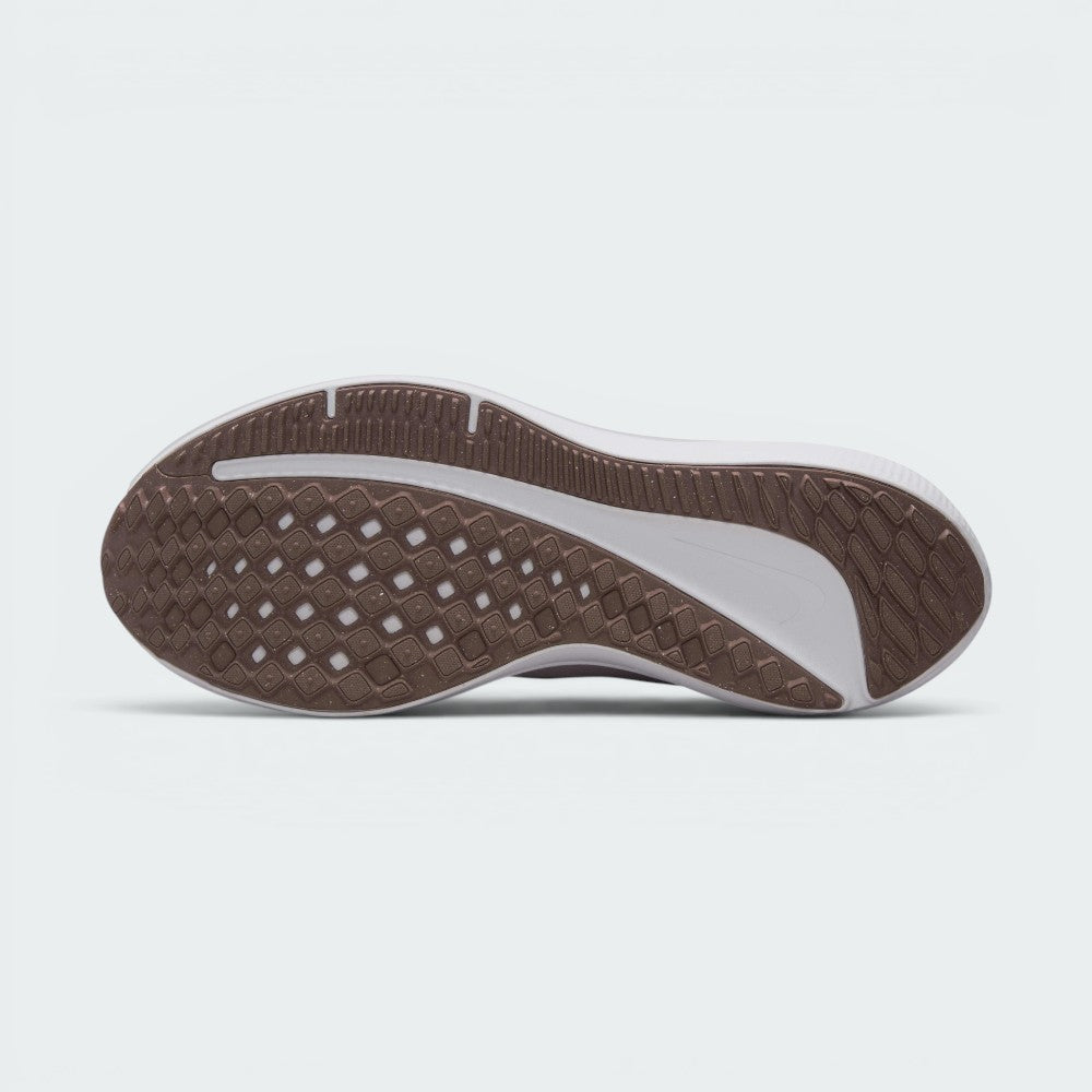 Displays the full-length brown rubber Waffle-inspired sole, showcasing the traction lugs engineered for unreal everyday road grip and smooth transitions.