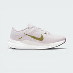 Highlights the inner profile of the shoe, displaying the clean line of the Pacific Moss Swoosh, the smooth overlay wrapping the heel base, and the balanced stance of the sole tooling.