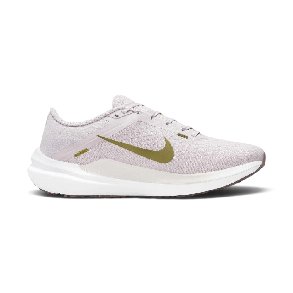 Highlights the inner profile of the shoe, displaying the clean line of the Pacific Moss Swoosh, the smooth overlay wrapping the heel base, and the balanced stance of the sole tooling.