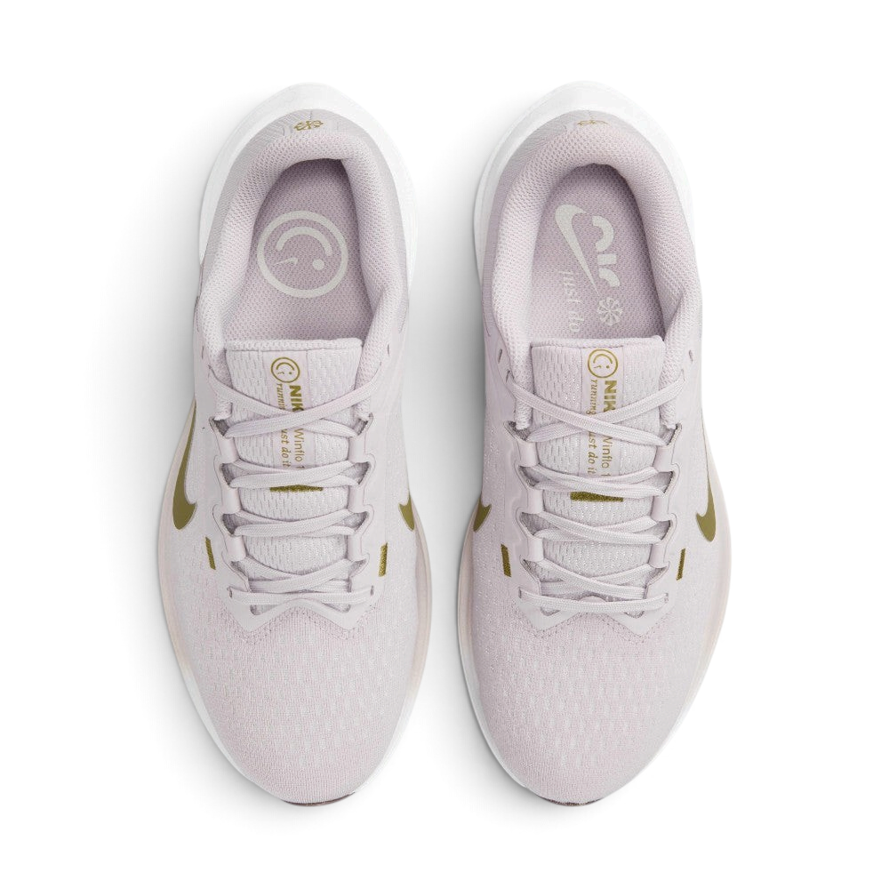 Focuses on the locked-in central lacing layout, displaying the perfect symmetry of the Platinum Violet mesh tongue, tonal laces, Pacific Moss "NIKE Winflo 10" text, and the smiley face insole graphics.