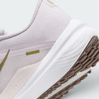 Highlights the "unreal" clean finish where the sculpted white foam midsole meets the debossed heel overlay and the dark brown Waffle rubber tread pods below.