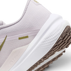 Highlights the "unreal" clean finish where the sculpted white foam midsole meets the debossed heel overlay and the dark brown Waffle rubber tread pods below.