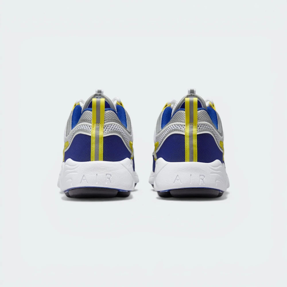 View from Behind Looking at the Heel: Focusing on the structured heel pull-tab and the streamlined finish of the foam midsole.