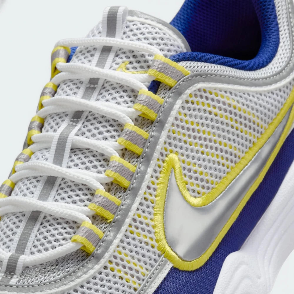 Zoom Looking at the Front of the Shoes and Laces: A close-up of the open-cell mesh texture and the precision-stitched overlays.