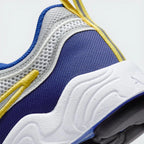 Zoom Looking at the Outsole and Midsole: Highlighting the "Air Zoom" branding and the intricate, podular design of the outsole.
