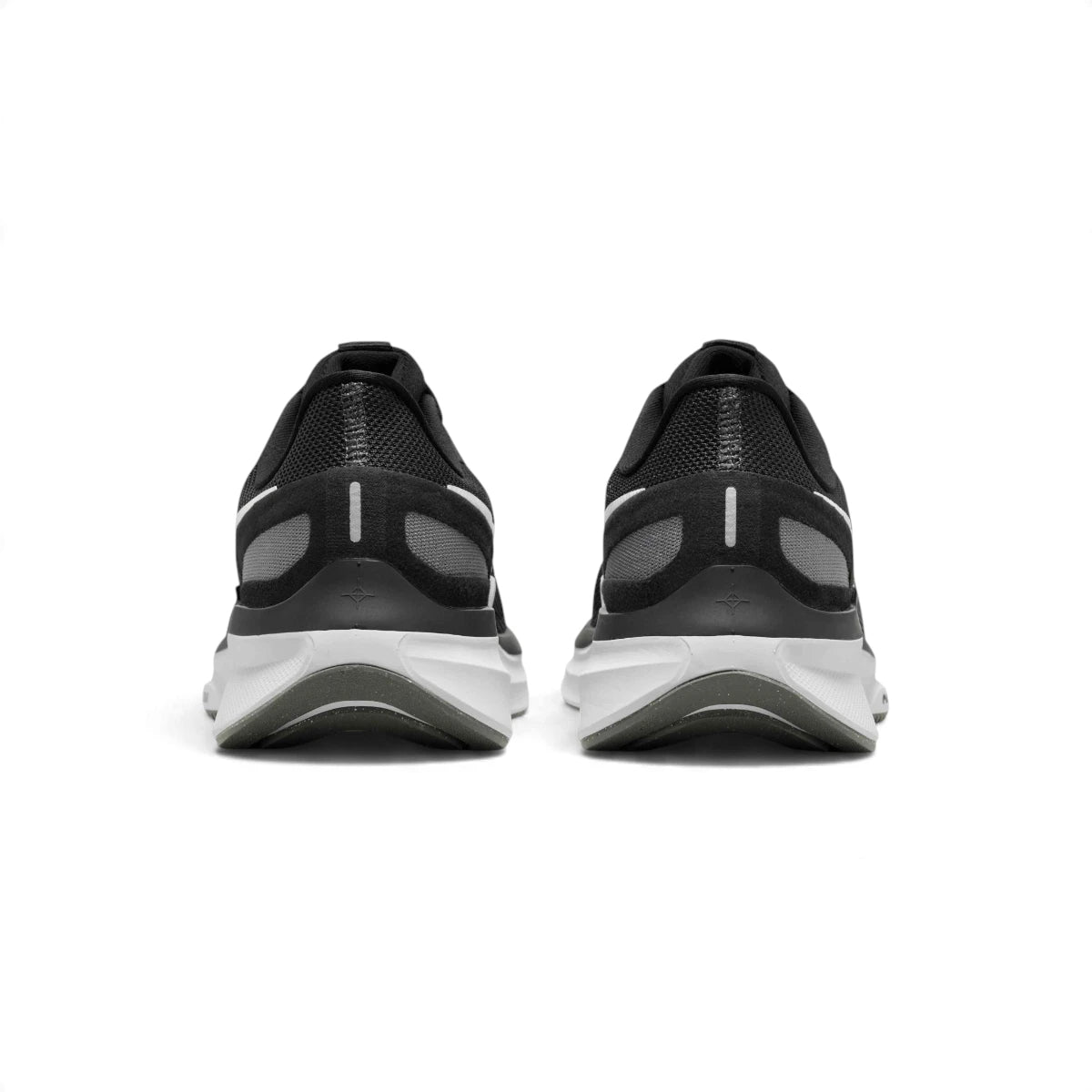  Rear view of the sneakers emphasising the supportive heel counters, reflective vertical stripe details, and curved sole geometry.
