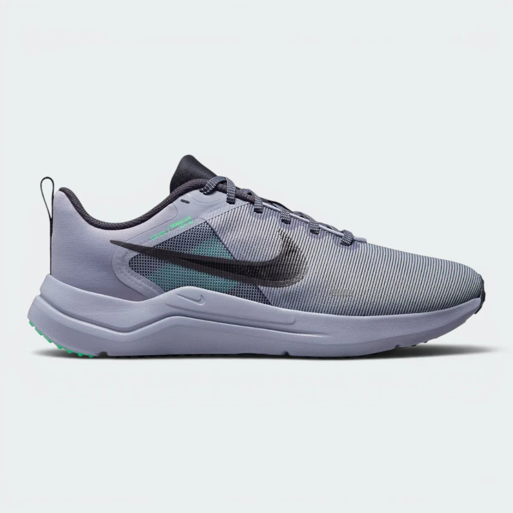Highlights the high-velocity "Indigo Haze" mesh and the professional finish of the foam midsole. Main image