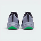 Focuses on the padded collar and the professional finish of the heel structure.