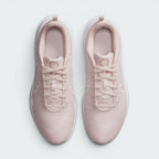 Focuses on the locked-in central lacing layout, displaying the clean symmetry of the pink mesh tongues, matching laces, circular Sunburst sustainability logos, and breathable forefoot mesh.