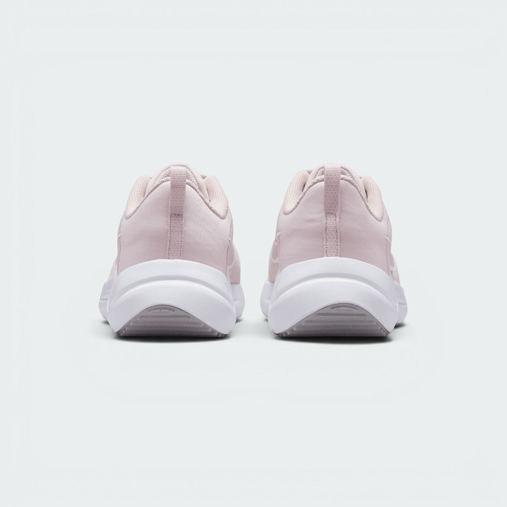 Focuses on the rear profile, highlighting the fabric heel pull loops, structured Barely Rose heel counters, and the wide flared base of the white foam midsole.