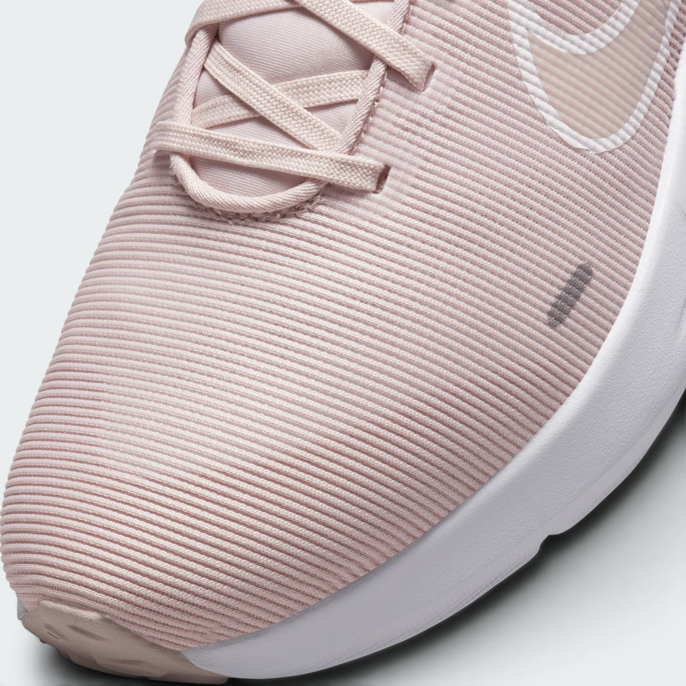 Details the micro-precision of the horizontal ribbed mesh upper, showing the reinforced toe cap seam and neat lace tracking.