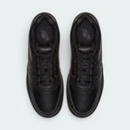 Focuses on the "locked-in" lacing system and the professional finish of the smooth toe box.
