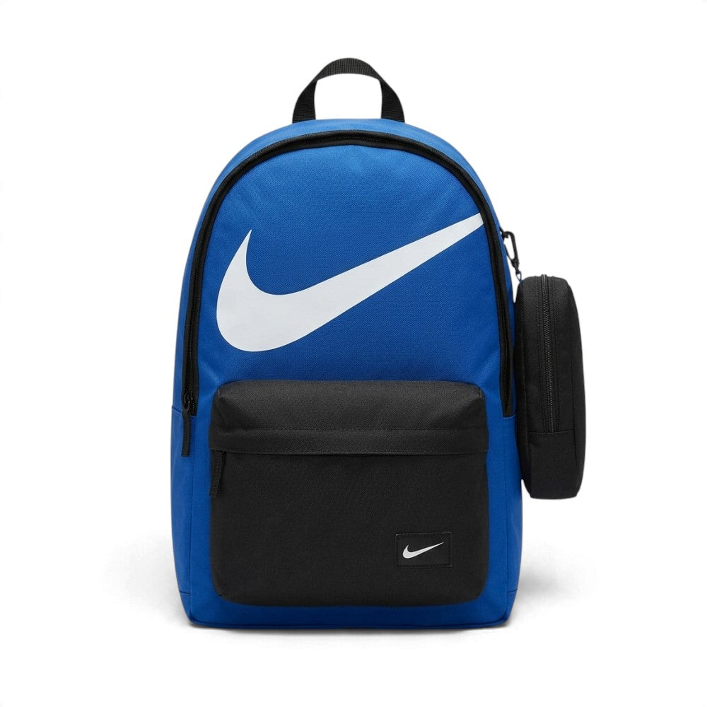 A Nike backpack in royal blue and black, featuring a large white Swoosh logo on the front, a black front zippered pocket, and a black side pouch, shown on a white background.