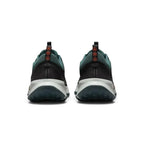 Rear view of the Nike Juniper Trail 2 Women's trail shoes, focusing on the structured heel and subtle branding.
