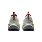 Focuses on the rear profile, highlighting the padded off-white heel collars, grey webbing pull tabs with circular trail icons, and the wide flared base of the sage green midsole and lugged rubber outsole.