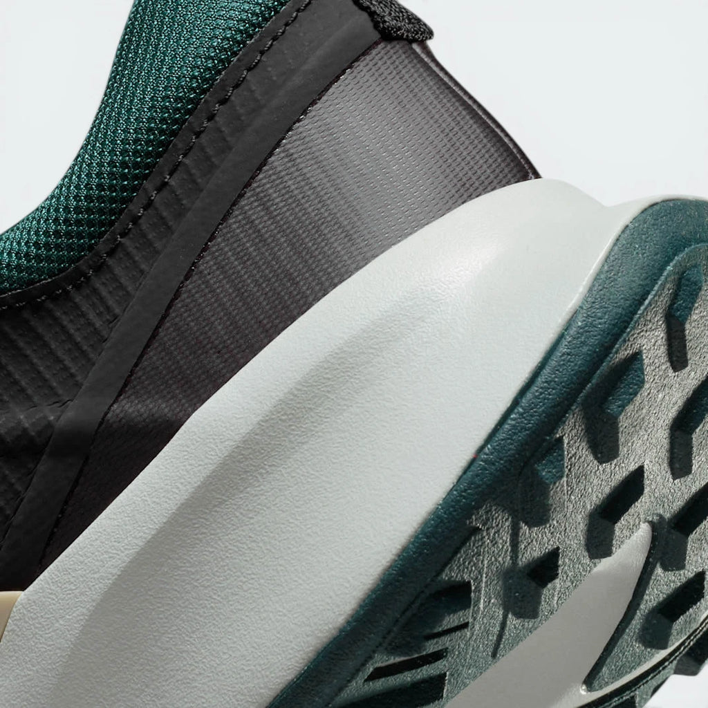 Highlights the "unreal" finish of the Nike Grind speckles and the stable, tough rubber construction.