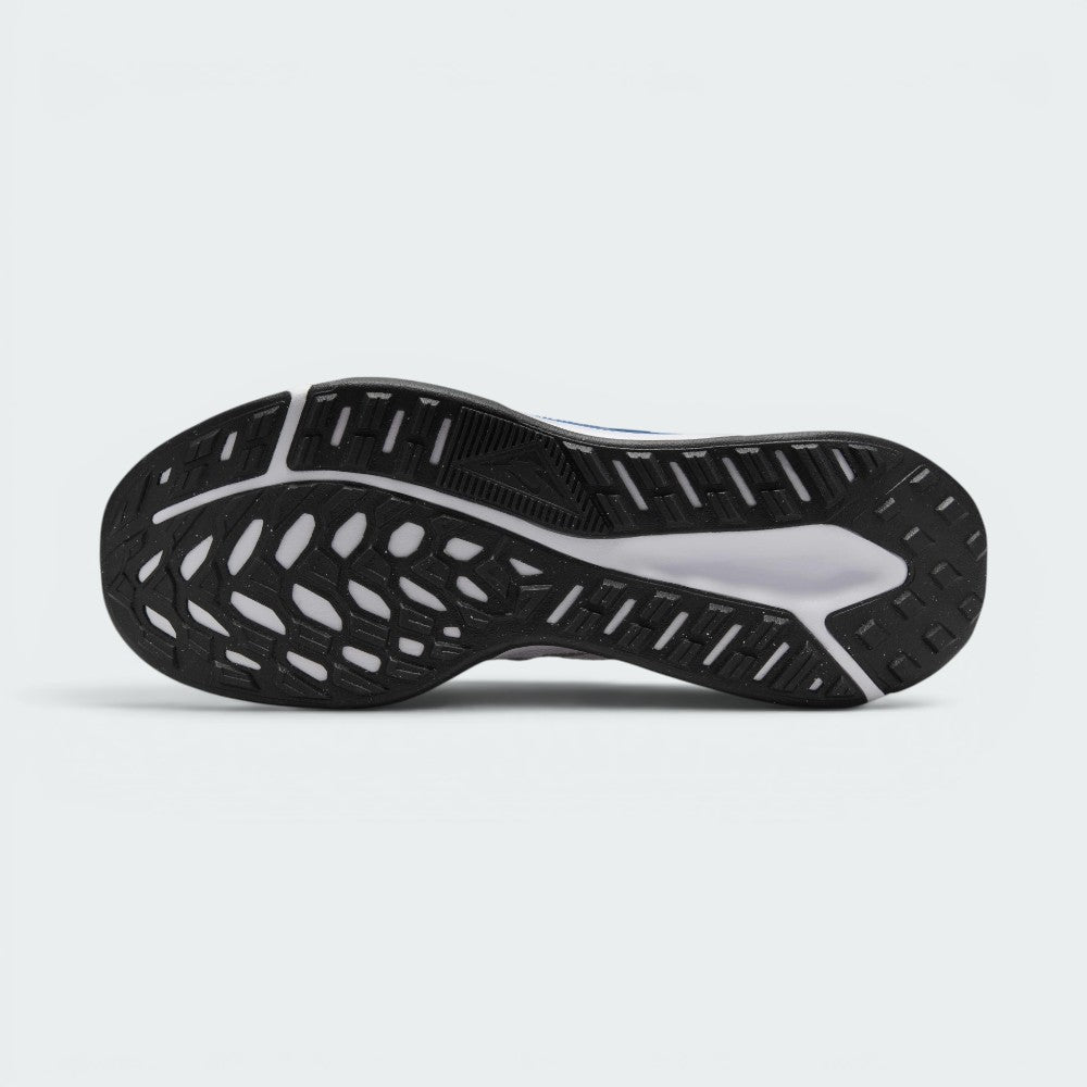 Displays the full-length black Nike Grind rubber sole, showcasing the speckled texture and multi-directional tapered lugs engineered for unreal traction on rocky paths.