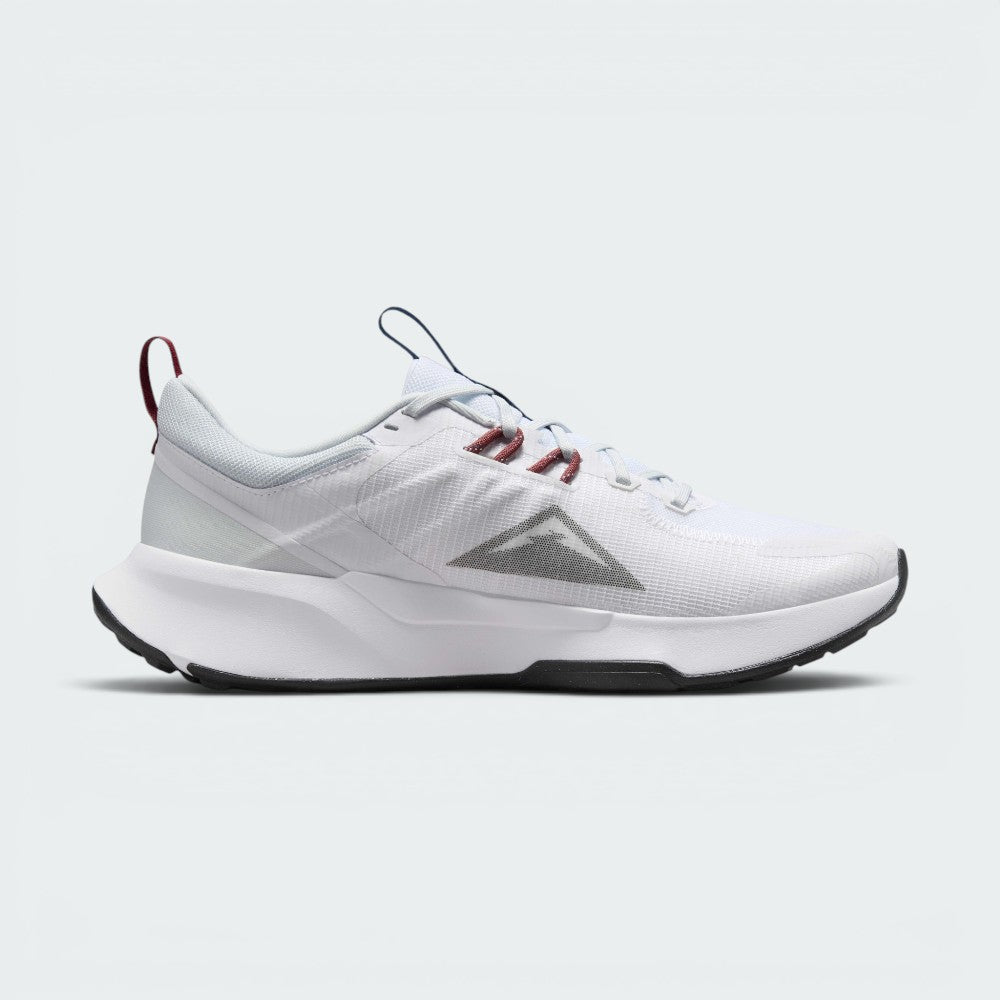 Highlights the inner profile showing the grey mountain peak logo, deep red lace loops, blue pull tab, and the smooth white foam midsole base.