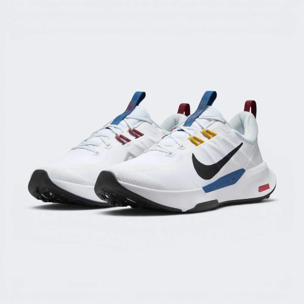 Emphasising the aggressive, low-cut off-road stance of the shoes and the professional harmony of the white uppers sitting above the multi-coloured trail accenting.