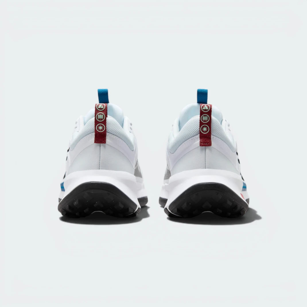 Focuses on the pull tab and the professional finish of the reinforced heel structure.
