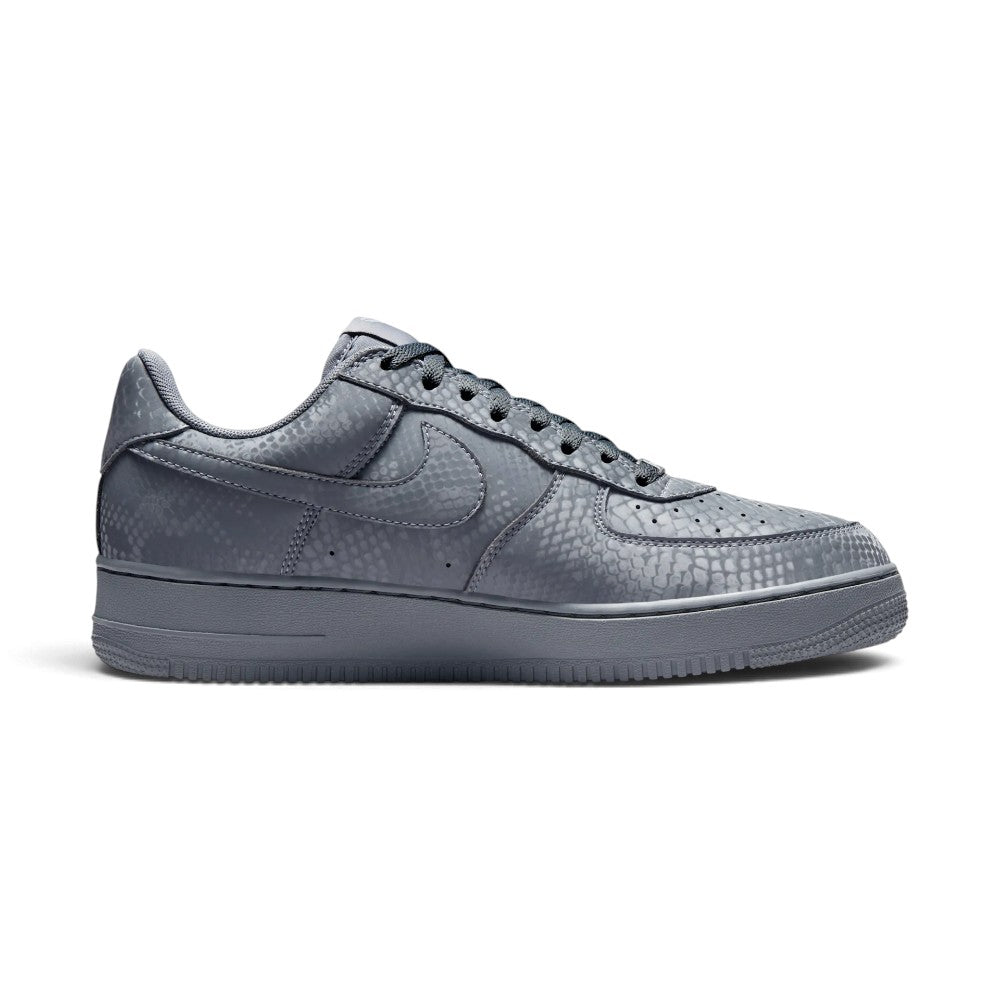 Black athletic shoe on a light gray background