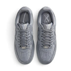 Direct overhead view of both shoes laid flat, showcasing the perforated forefoot panels, flat grey laces threaded through clean eyelets, branded tongues, and cushioned collar openings.